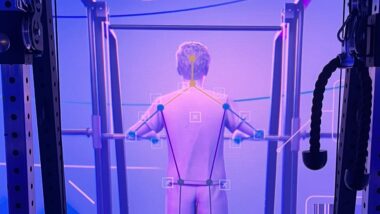 'This just knows so much more than a human ever could': Meet CoachCube, the intelligent AI personal trainer that lives inside a Tron-style box room